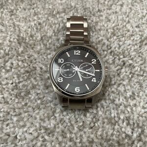 Citizen Eco-Drive Silver Watch with Black Dial